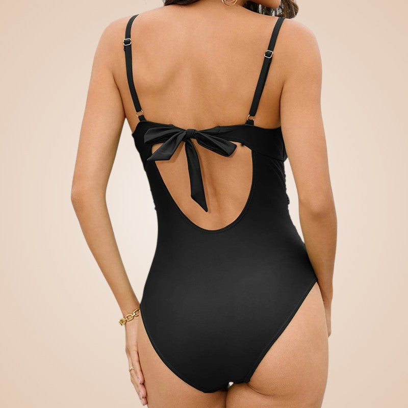 Maillot de bain femme sculptant noir une pièce vu de dos avec dos ouvert, nœud décoratif et coupe élégante