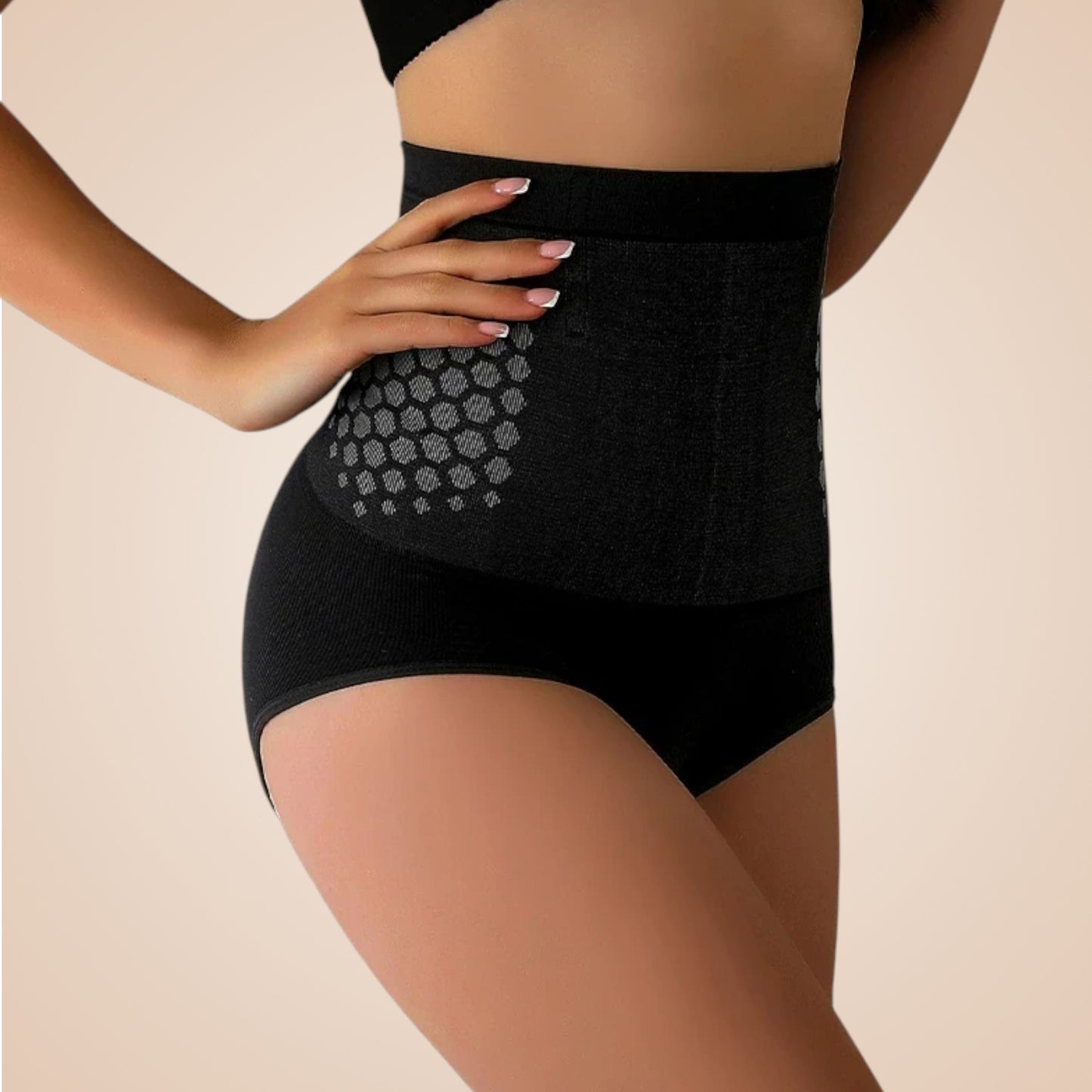 Culotte gainante noire taille haute avec motif hexagonal sur les flancs.