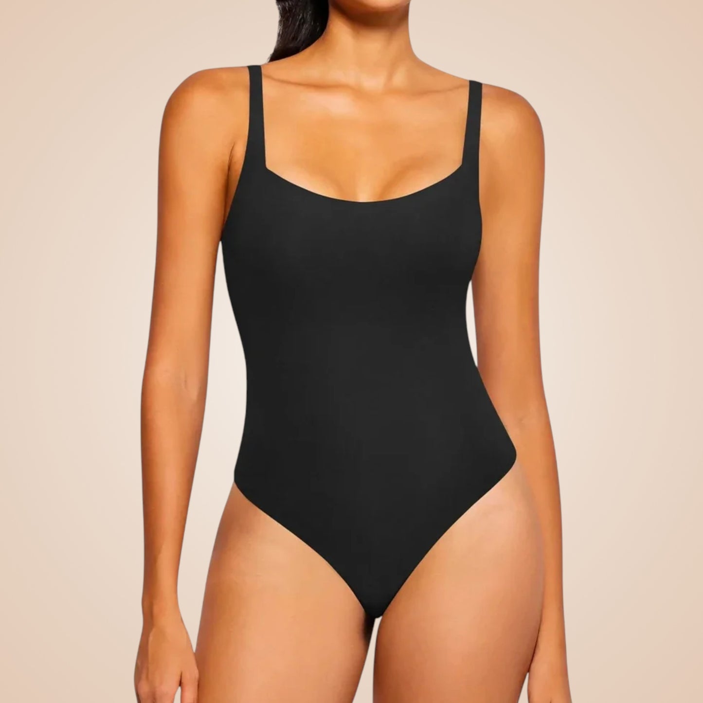 Body amincissant noir pour femme, lingerie sculptante effet ventre plat avec bretelles fines, invisible sous les vêtements pour affiner la silhouette.