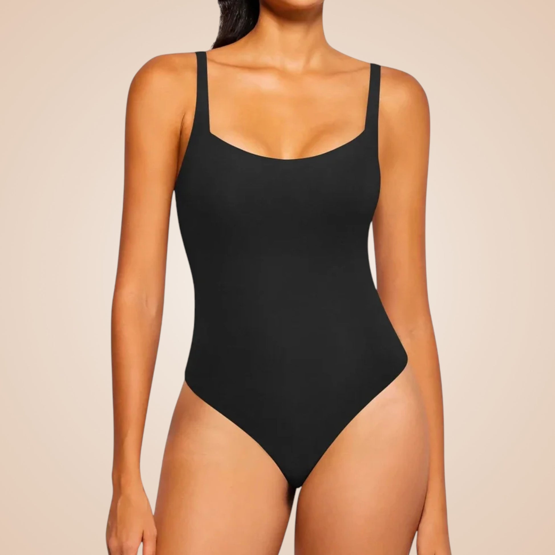 Body amincissant noir pour femme, lingerie sculptante effet ventre plat avec bretelles fines, invisible sous les vêtements pour affiner la silhouette.