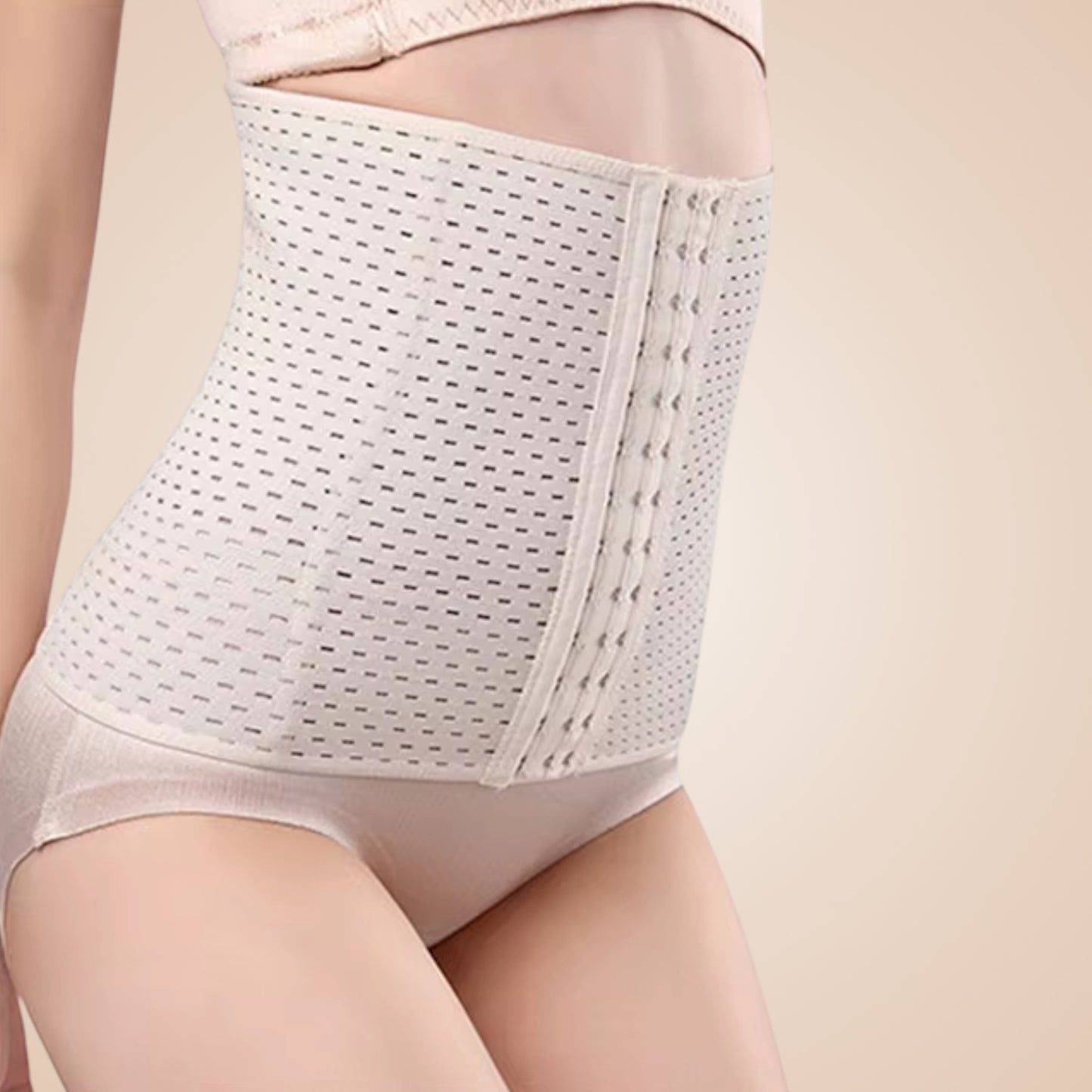 Bustier corset nude en maille ajourée avec fermeture à crochets frontale.