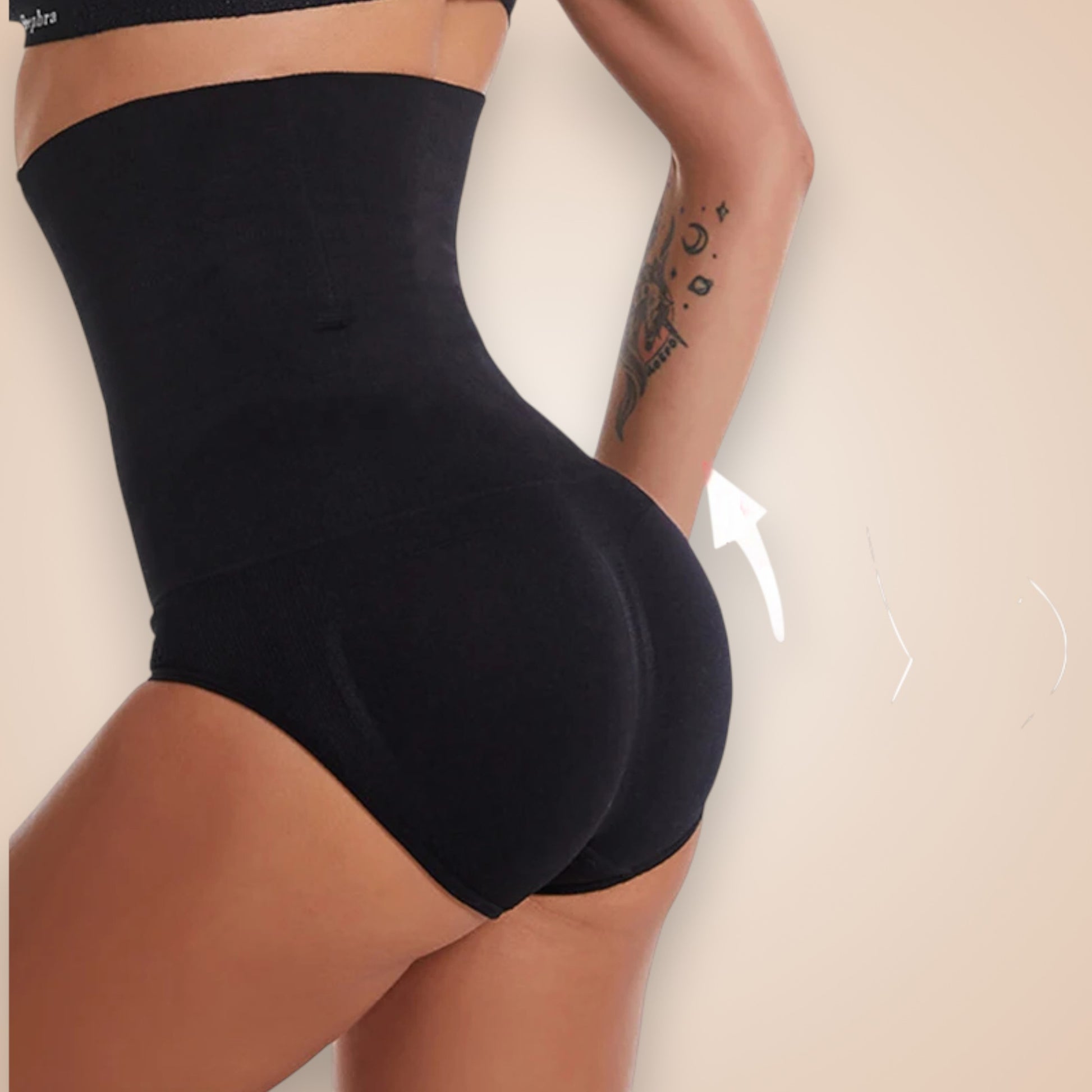 Gaine ventre plat noire taille haute sculptant la silhouette avec finition lisse.