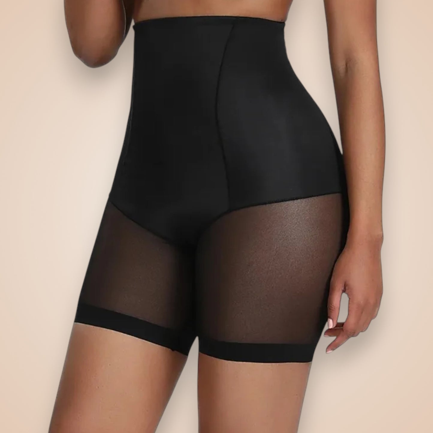 Short gainant noir femme taille haute effet ventre plat, lingerie sculptante avec empiècements transparents sur les cuisses pour une silhouette galbée et élégante.